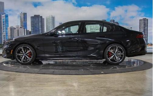 Black Sapphire Metallic 2027 BMW 550e xDrive