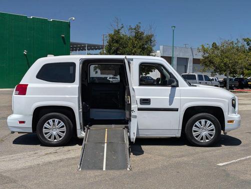 White 2014 AM General MV-1 Wheelchair Access Handicap Passenger Mini Van