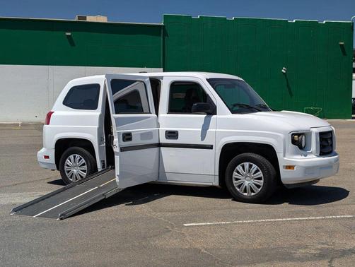 White 2014 AM General MV-1 Wheelchair Access Handicap Passenger Mini Van