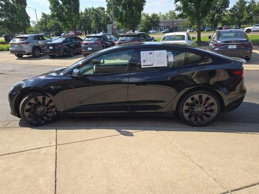 Solid Black 2023 Tesla Model 3 Performance