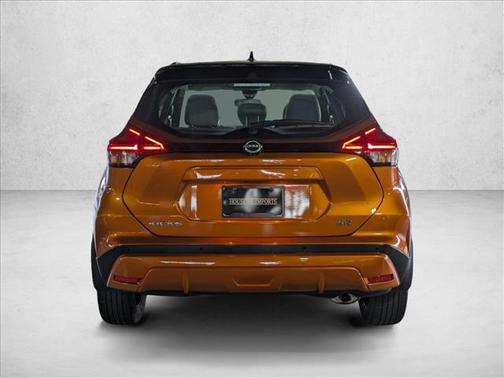 Monarch Orange Metallic/Super Black 2023 Nissan Kicks SR