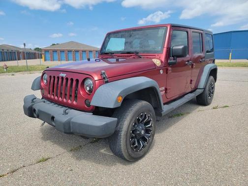 Red 2012 Jeep Wrangler Unlimited Sport