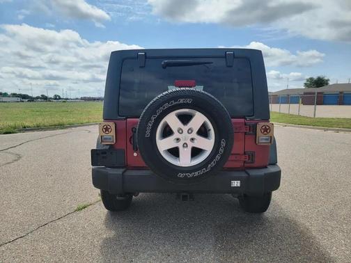 Red 2012 Jeep Wrangler Unlimited Sport