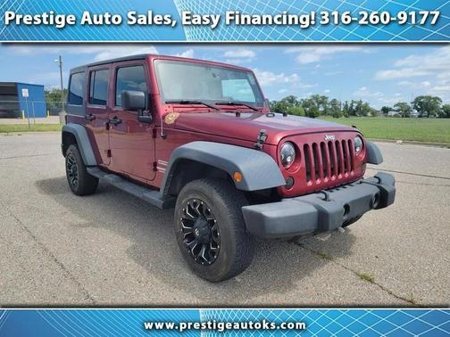 Red 2012 Jeep Wrangler Unlimited Sport