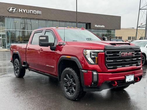Volcanic Red 2024 GMC Sierra 2500 AT4