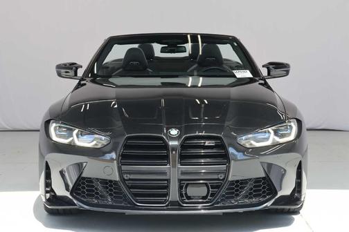 Black Sapphire Metallic 2024 BMW M4 Competition xDrive