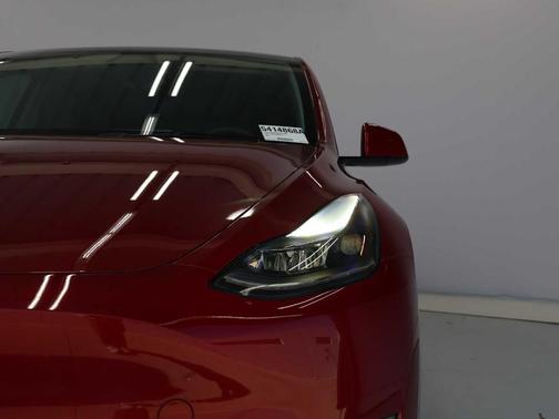 Red 2024 Tesla Model Y Long Range