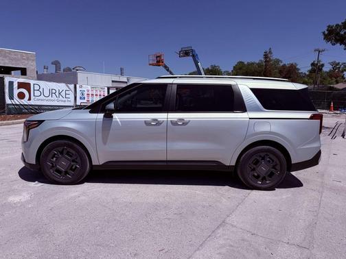 Ivory Silver 2026 Kia Carnival Hybrid EX