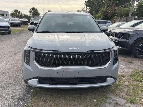 Ceramic Silver 2025 Kia Carnival Hybrid EX