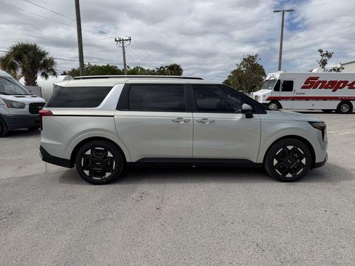 Ivory Silver 2026 Kia Carnival EX