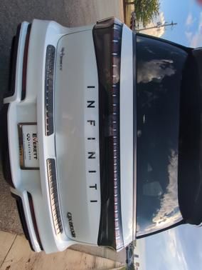 Radiant White/Black Obsidian 2027 INFINITI QX80 SPORT
