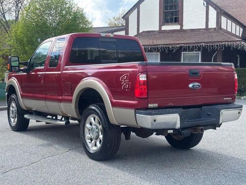 Red 2014 Ford F-250 Lariat