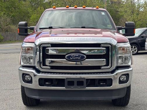 Red 2014 Ford F-250 Lariat