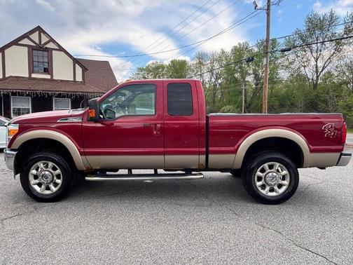 Red 2014 Ford F-250 Lariat