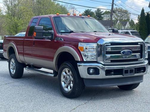 Red 2014 Ford F-250 Lariat