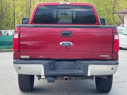 Red 2014 Ford F-250 Lariat
