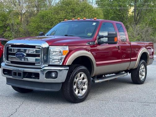 Red 2014 Ford F-250 Lariat