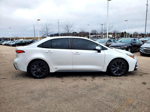 Wind Chill Pearl 2023 Toyota Corolla Hybrid SE