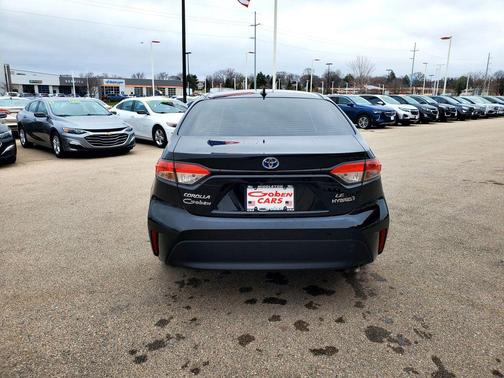 Midnight Black Metallic 2024 Toyota Corolla Hybrid SE