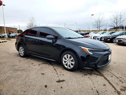 Midnight Black Metallic 2024 Toyota Corolla Hybrid SE