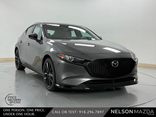 Machine Gray Metallic 2026 Mazda Mazda3 AWD w/Premium Package