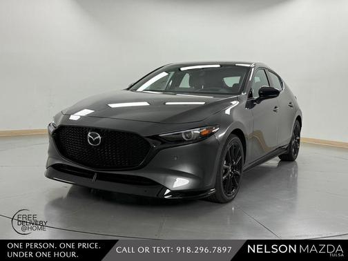 Machine Gray Metallic 2026 Mazda Mazda3 AWD w/Premium Package