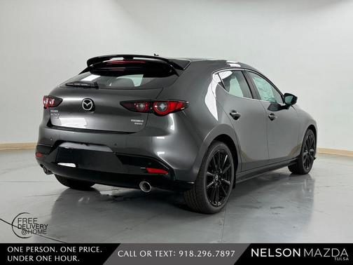 Machine Gray Metallic 2026 Mazda Mazda3 AWD w/Premium Package