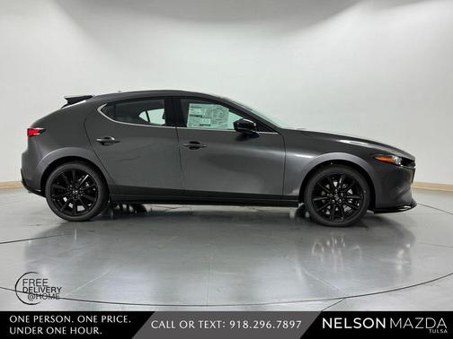 Machine Gray Metallic 2026 Mazda Mazda3 AWD w/Premium Package