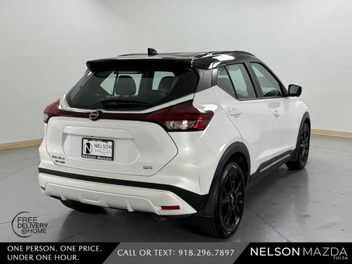 Aspen White / Super Black 2023 Nissan Kicks SR