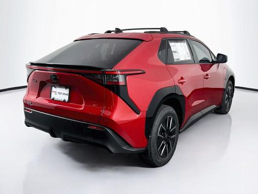 Supersonic Red w/Black Overfenders 2026 Toyota bZ XLE