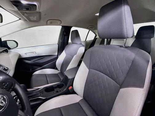 Midnight Black Metallic 2024 Toyota Corolla Hybrid LE