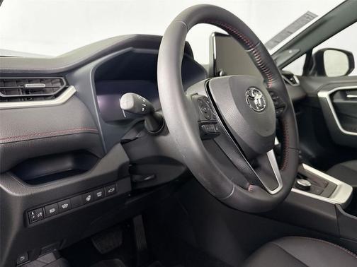 Silver Sky Metallic w/Midnight Black Metallic Roof 2025 Toyota RAV4 Hybrid SE