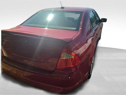 Red 2010 Ford Fusion SE