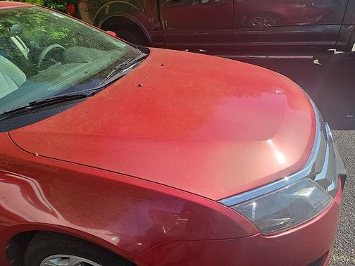 Red 2010 Ford Fusion SE