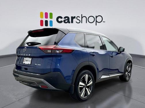 Caspian Blue Metallic/Super Black 2023 Nissan Rogue SL