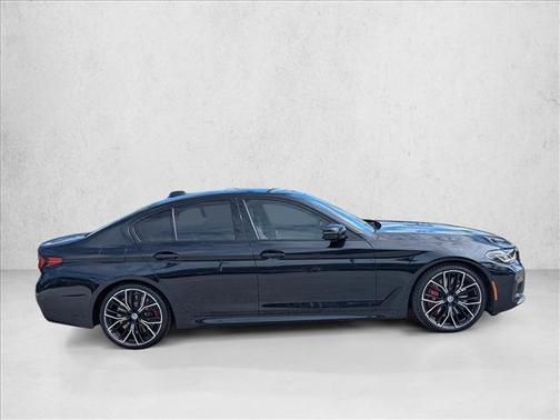 Carbon Black Metallic 2023 BMW M550 i Xdrive