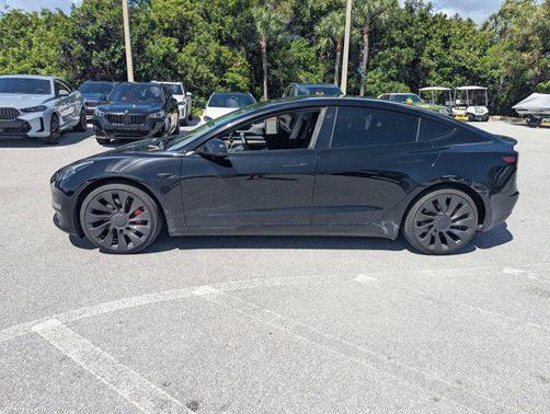 Solid Black 2023 Tesla Model 3 Performance