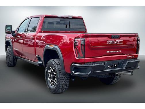 Volcanic Red Tintcoat 2026 GMC Sierra 2500 AT4X