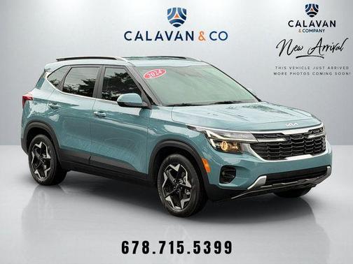 Blue 2024 Kia Seltos EX