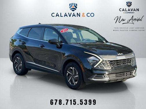 Fusion Orange 2023 Kia Sportage Hybrid LX
