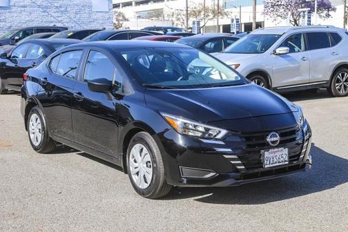 Black 2025 Nissan Versa 1.6 S