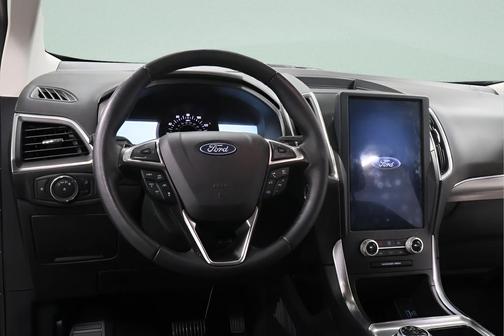 Forged Green Metallic 2023 Ford Edge Titanium