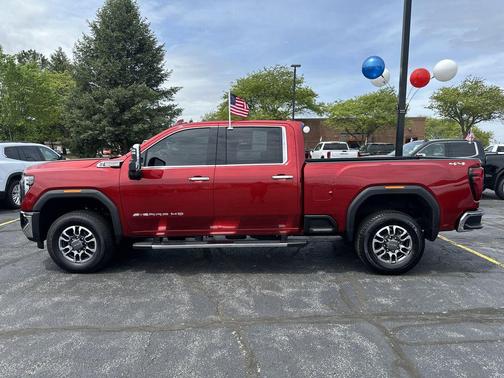 Volcanic Red Tintcoat 2026 GMC Sierra 2500 SLT