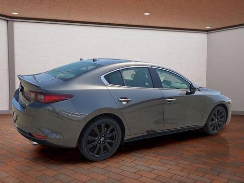 Machine Gray Metallic 2026 Mazda Mazda3 AWD w/Premium Package