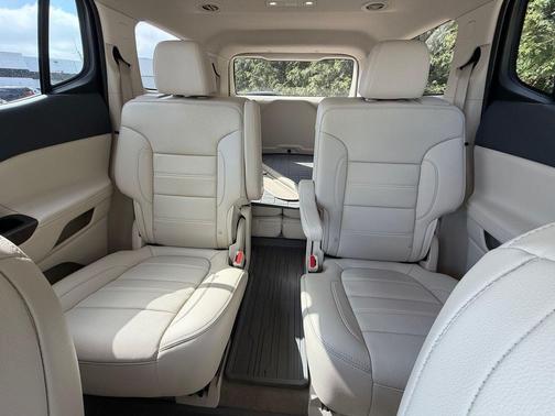 Volcanic Red Tintcoat 2023 GMC Acadia Denali