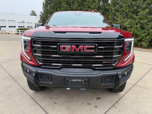 Volcanic Red Tintcoat 2026 GMC Sierra 1500 AT4X