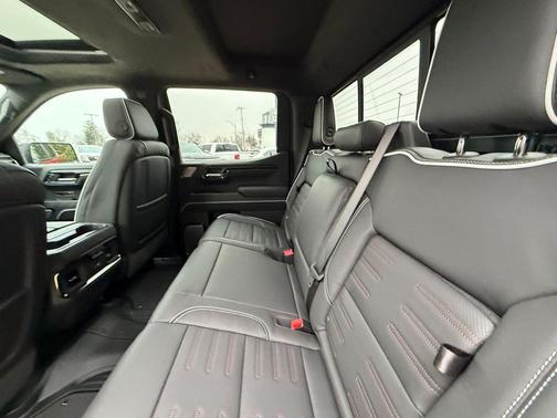 Volcanic Red Tintcoat 2026 GMC Sierra 1500 AT4X