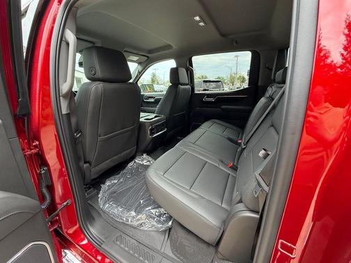 Volcanic Red Tintcoat 2026 GMC Sierra 1500 SLT