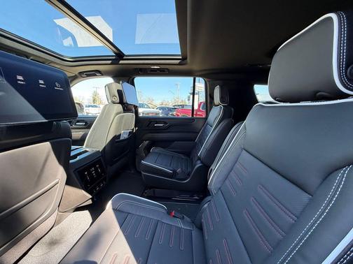 Volcanic Red Tintcoat 2026 GMC Yukon XL 4WD AT4 Ultimate