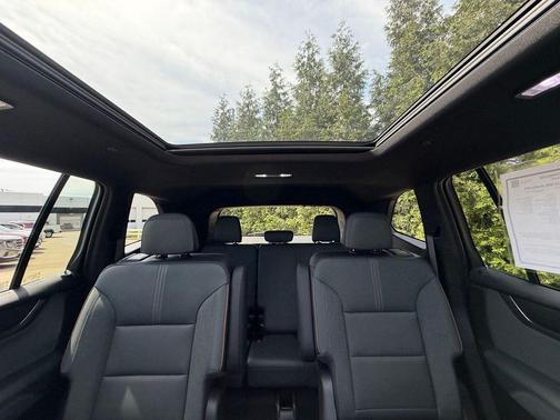 Volcanic Red Tintcoat 2025 GMC Acadia AWD AT4